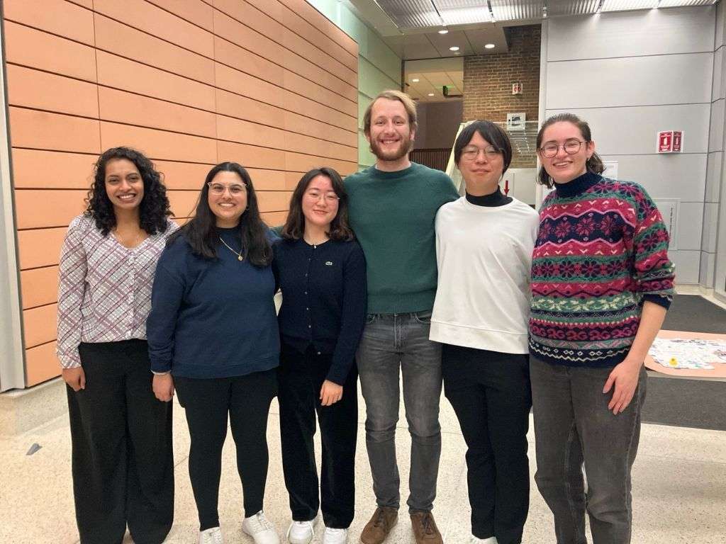 Biochemistry holiday party 2024 – Team members posing together at a holiday celebration.