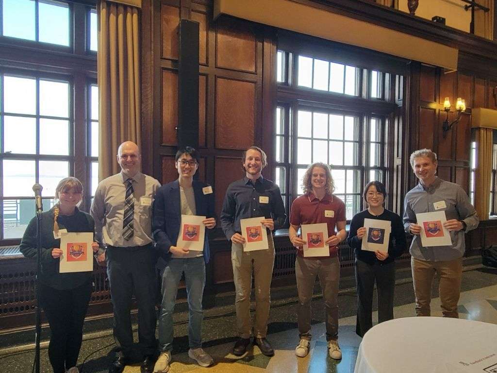 Juyoung and Jack at the Nutrition and Metabolism Poster Presentation awards, 2025 – Researchers standing with award certificates.